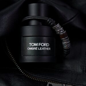 Tom Ford Ombré Leather fragrance bottle surrounded by luxurious black leather.
